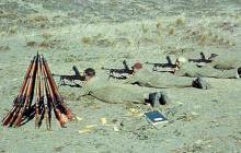 Having fun shooting .303 Bren Guns on full automatic.  Our personal Lee Enfield .303 rifles stacked.