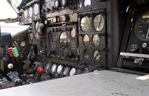 The inspiring, modern cockpit of a Bristol Freighter.  Note the colour coded control levers!