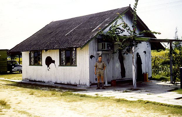 1960:  41 Squadron aircrew hut at RAF Changi with Ken Walker outside