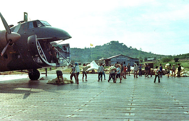 1975: 41 Squadron aircraft unloading at An Toi airfield, Vietnam