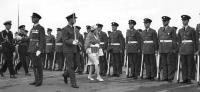1963 March, Christchurch: Me walking with Her Majesty, Queen Elizabeth II, presenting the 100 man Guard of Honour.